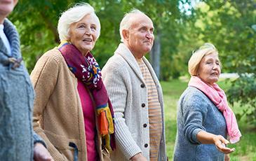 older people walking outside