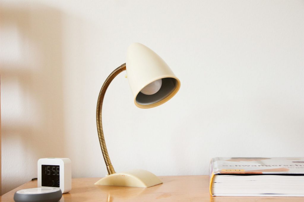 desk lamp on a wooden table
