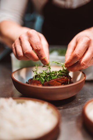 chef preparing a dinner for a resident