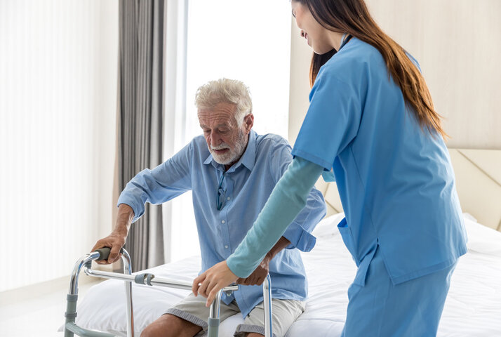 resident using a walking aid